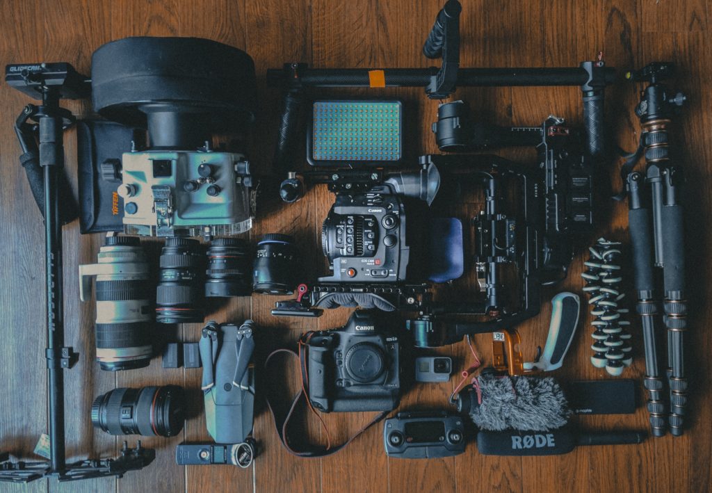 camera gear on table - Crew Connection